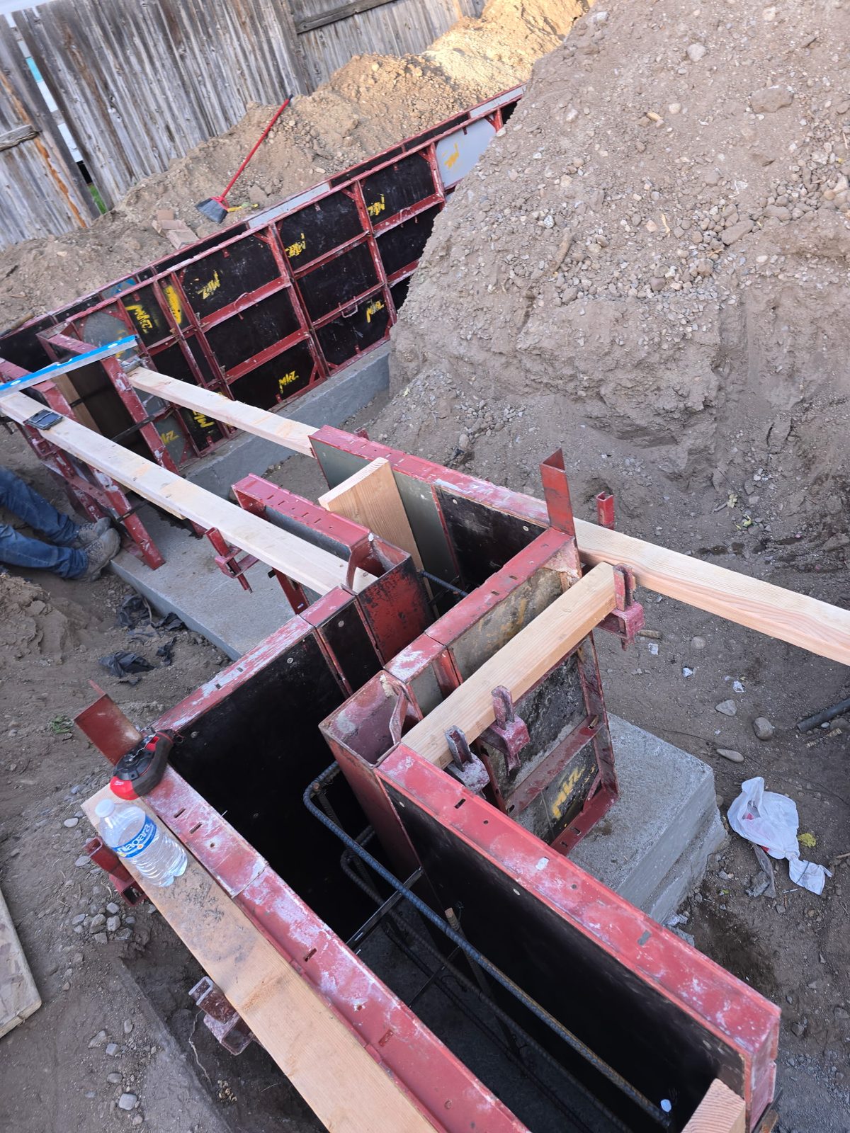 Foundation wall forms set in excavation