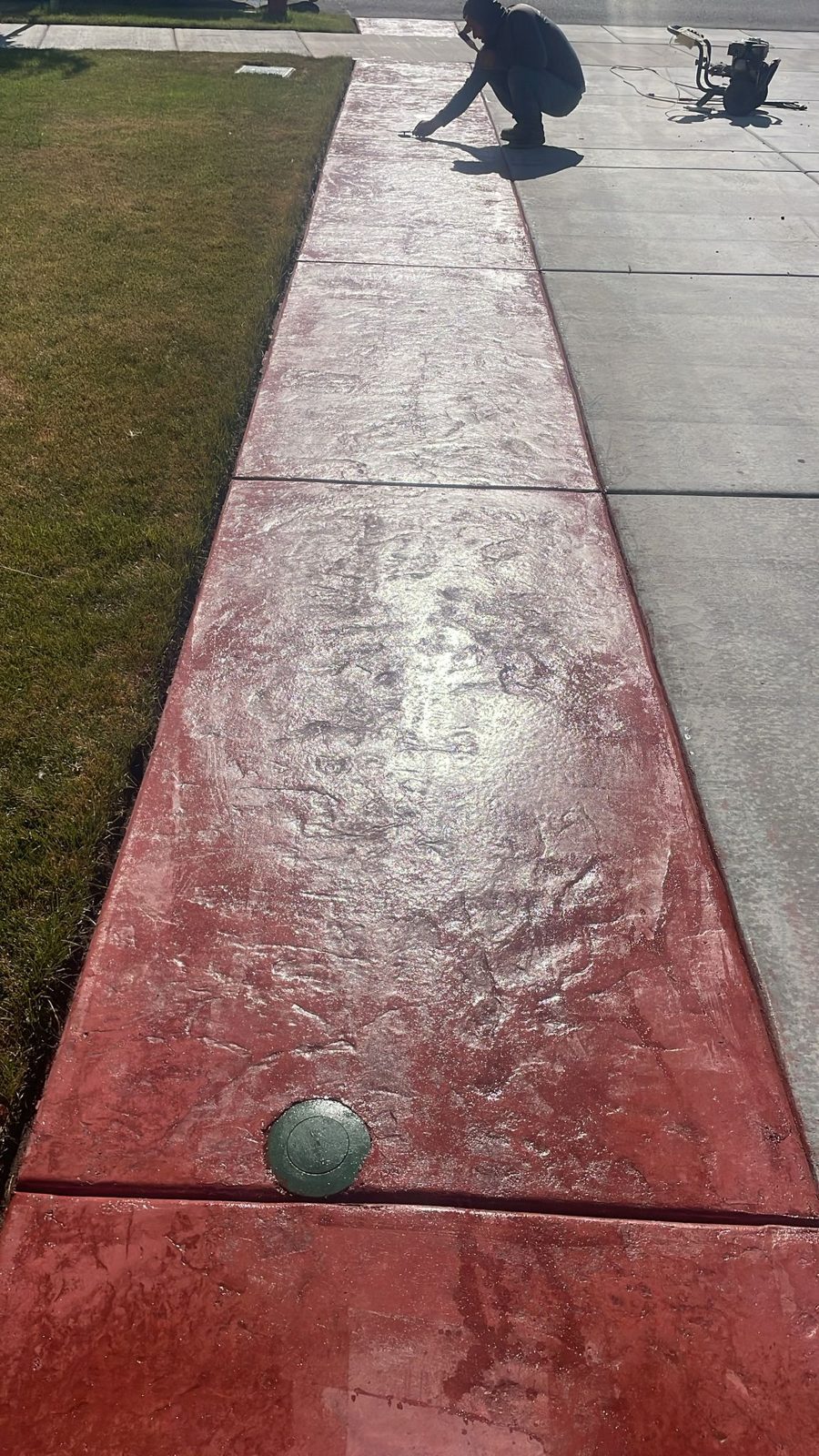Red stamped concrete walkway